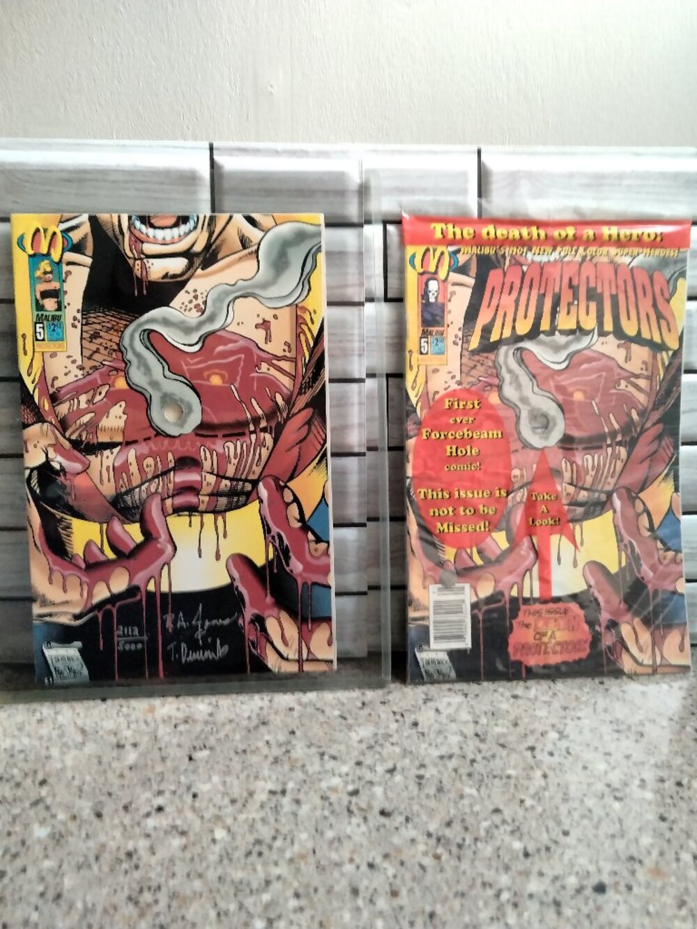DUO: Protectors Signed/ Numbered Forcebeam Hole Issue Comics